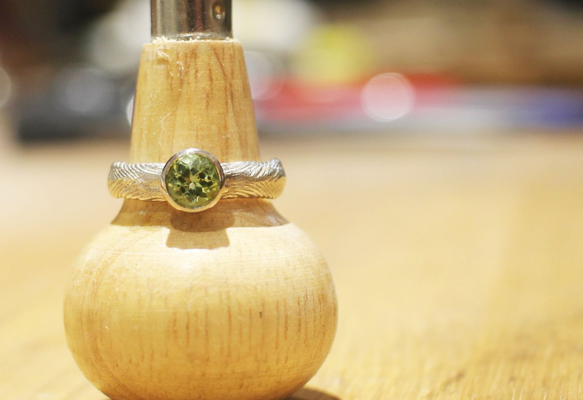 Fitzjewels's tweet photo. Fancy something a little different this Christmas? How about this silver cuttlefish shank with palladium rub-over setting set with green tourmaline? #madeincanterbury #fitzgeralds https://t.co/3dQHPt7CXJ