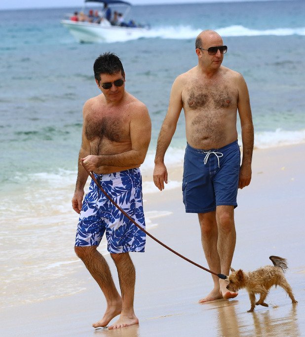 LOL! - 'Challenge of the Season' - FIND OUT where deluded uber-gay, super-camp Simon Cowell's long-suffering gay partner Paul McKenna's hiding, amidst #Beard Lauren, surrogate IVF child Eric, &amp; distractional set dressing at #SandyLaneBarbados! dailym.ai/2C4DJJt #XmasAlert!