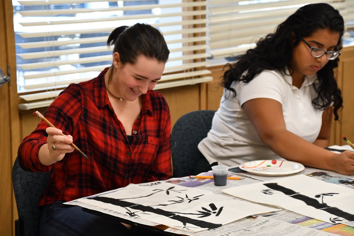 RPCSTweets's tweet photo. Chinese II & III students learning from guest artist Lau Kwai Yu about the characteristics of Chinese watercolor painting and how to paint images of bamboo and panda using only ink, water & a brush #RPCSupperschool #learningatRPCS #dressdownday #spiritweek https://t.co/ze3zTxAiwQ