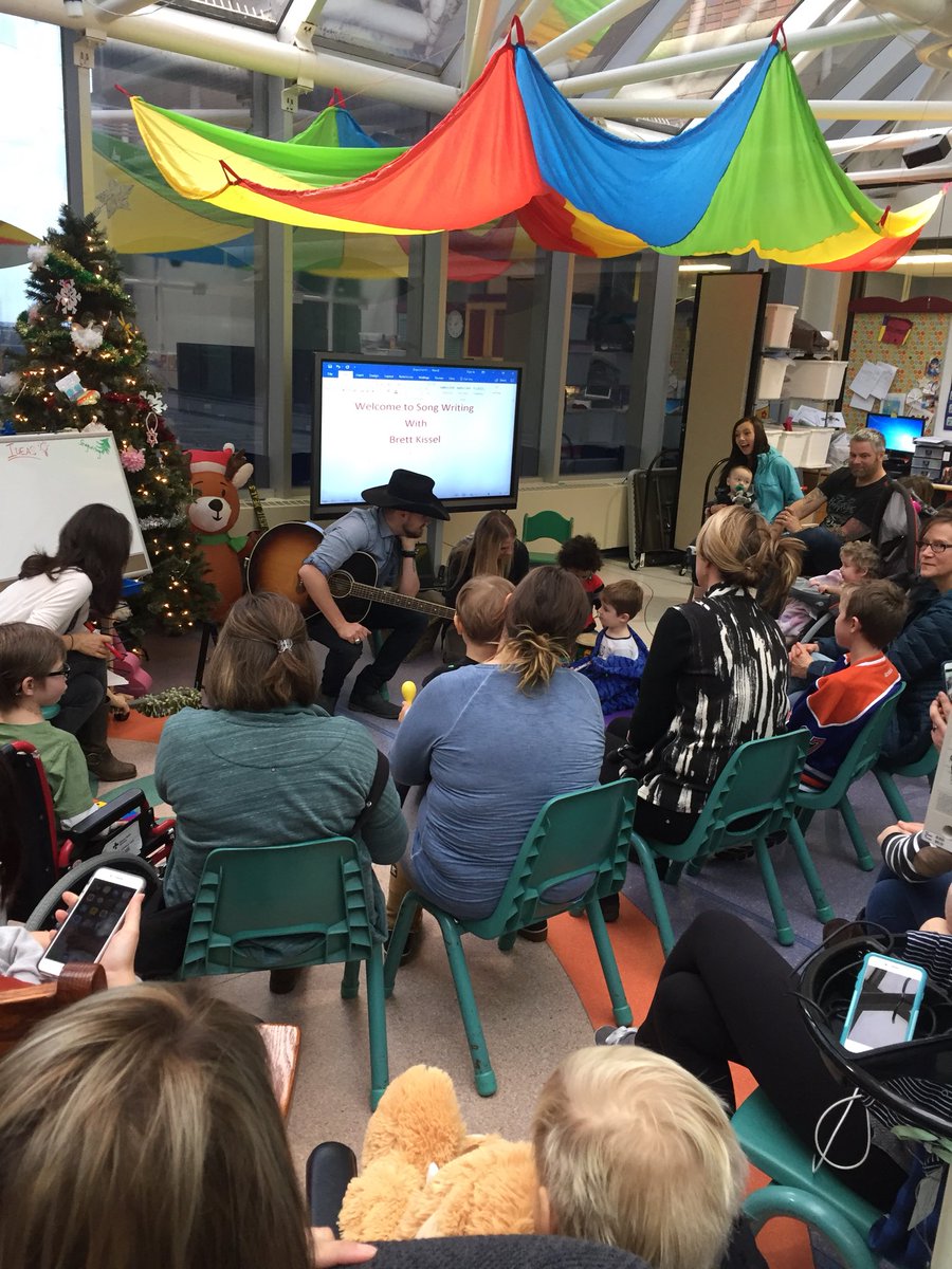 ChrisScheetz's tweet photo. On his day in #YEG @BrettKissel gives back to the @StolleryKids as they work on writing a song. #MusicTherapy https://t.co/AMTpJbG0fe