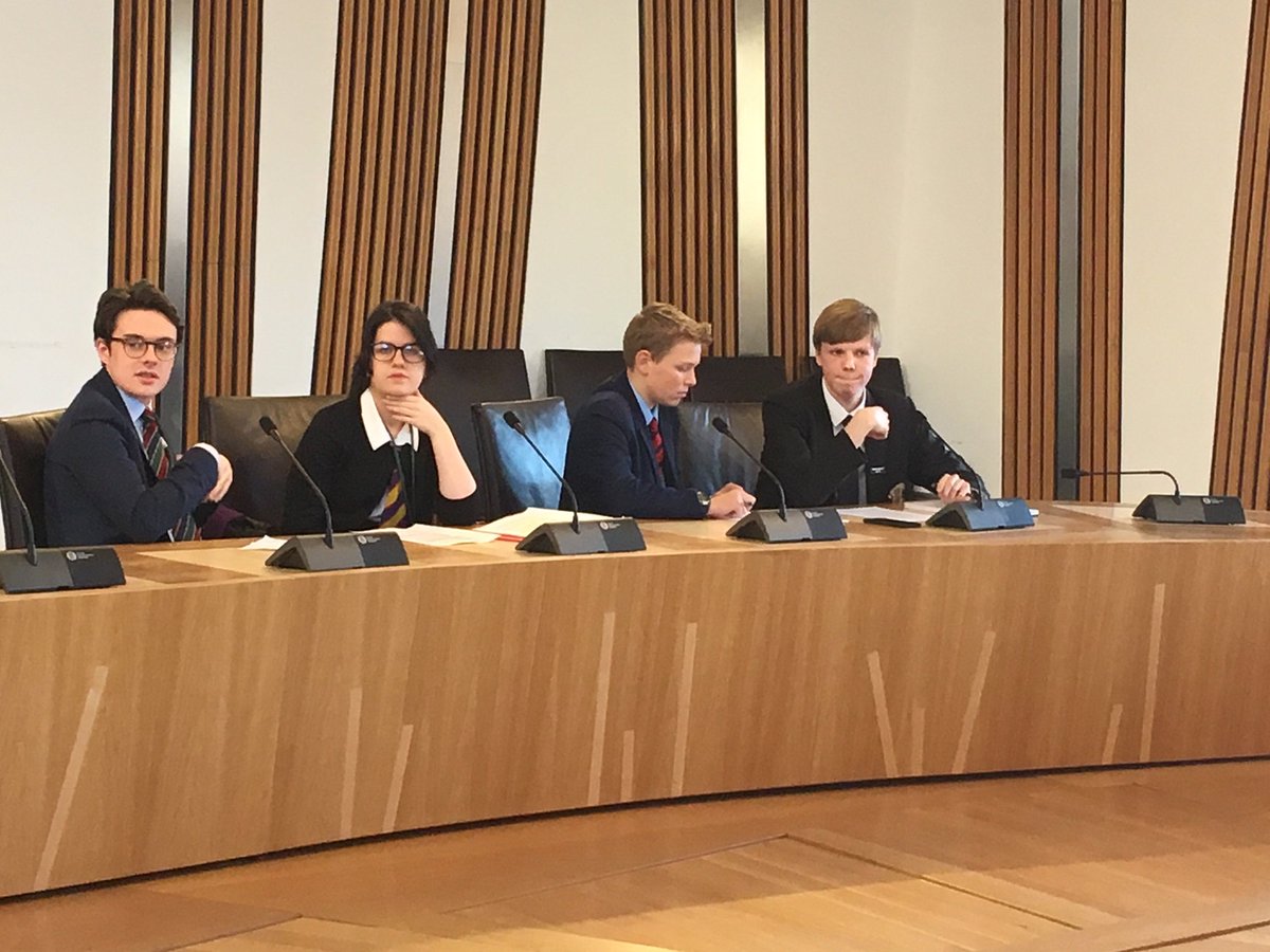 StLeonards_Head's tweet photo. Well done to St Leonards students Archie and Hannah who took part in the St Andrews Day Debate at @ScotParl in #Edinburgh! Both students picked up plenty of new techniques to try out with our own Debating Society at school. #DebatingDay https://t.co/wUy66MFHj4