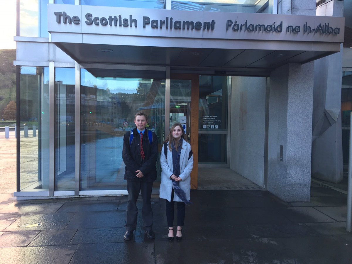 StLeonards_Head's tweet photo. Well done to St Leonards students Archie and Hannah who took part in the St Andrews Day Debate at @ScotParl in #Edinburgh! Both students picked up plenty of new techniques to try out with our own Debating Society at school. #DebatingDay https://t.co/wUy66MFHj4
