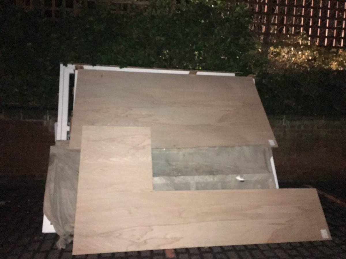OldRoyalFree's tweet image. Yesterday evening (11/12/17) Old Royal Free Place car park area; left  unsecured, without notification, warning, nor explanation: heavy objects  (Identified as panels, frames, etc) leaning heavily against resident's  wall/trellis @Clarion_Group @familymosaic @circlehousing