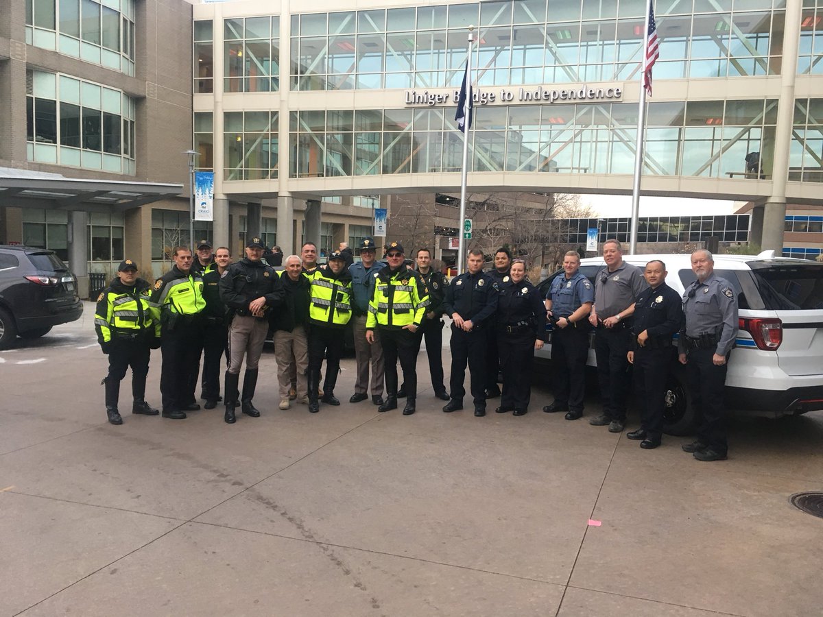 DCSOTraffic's tweet photo. Honored and humbled to help escort Deputy McMillan to DIA so he can be home for Christmas. #returninghero. @RSO @LVMPD https://t.co/TxJByA6eHj