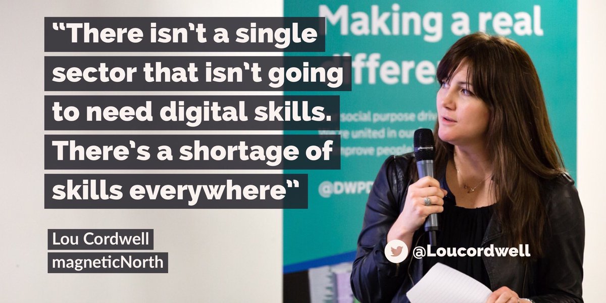 Picture of Lou Cordwell presenting to DWP colleagues at our leadership event