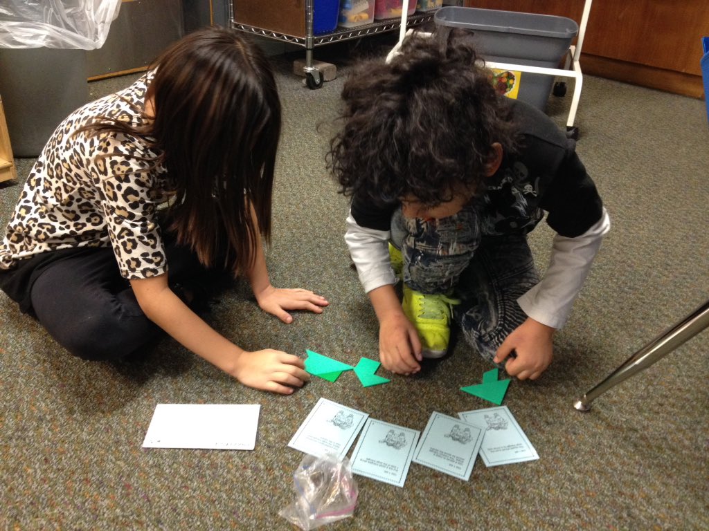 Csdmryan's tweet photo. Lyle's &amp; Ryan's class working together to create a design meeting criteria of specific clues #collaboration #rberoadrunner #Centersd https://t.co/JhvOmPVBcG