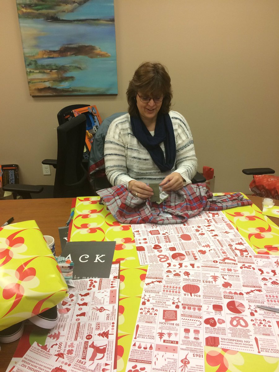 youthvillagesOR's tweet photo. In our Redmond office today, some staff finished all the #holidayheroes wrapping and some fun holiday spirit! Thanks again, @SCRAPPDX for the wrapping materials! #scrappdx https://t.co/dWrMaAjQLg