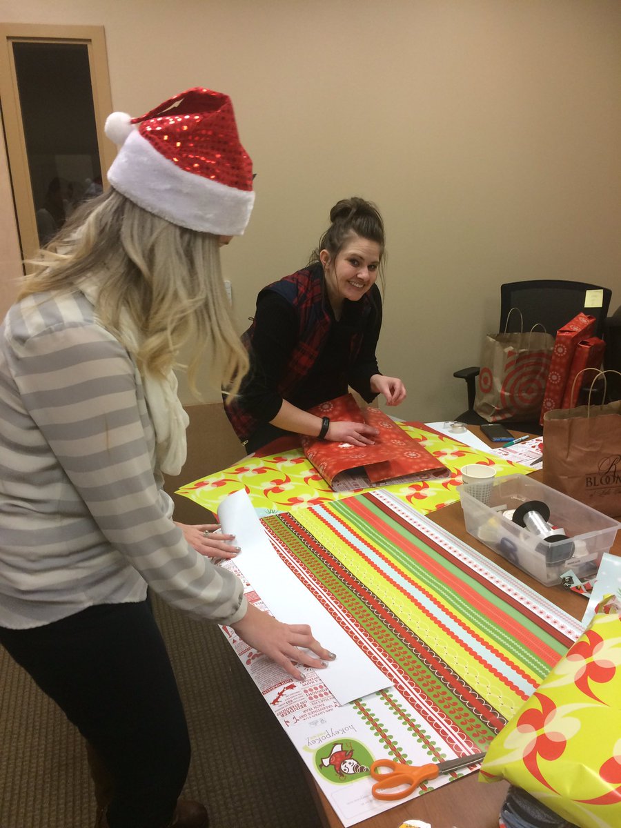 youthvillagesOR's tweet photo. In our Redmond office today, some staff finished all the #holidayheroes wrapping and some fun holiday spirit! Thanks again, @SCRAPPDX for the wrapping materials! #scrappdx https://t.co/dWrMaAjQLg