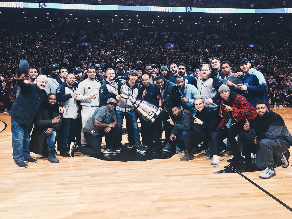 NBACanada's tweet photo. The 2017 @CFL Grey Cup Champs, @TorontoArgos, visit the @Raptors with their shiny new friend! 🏆

#ArgosFootball x #WeTheNorth https://t.co/tAeIHfcT1D