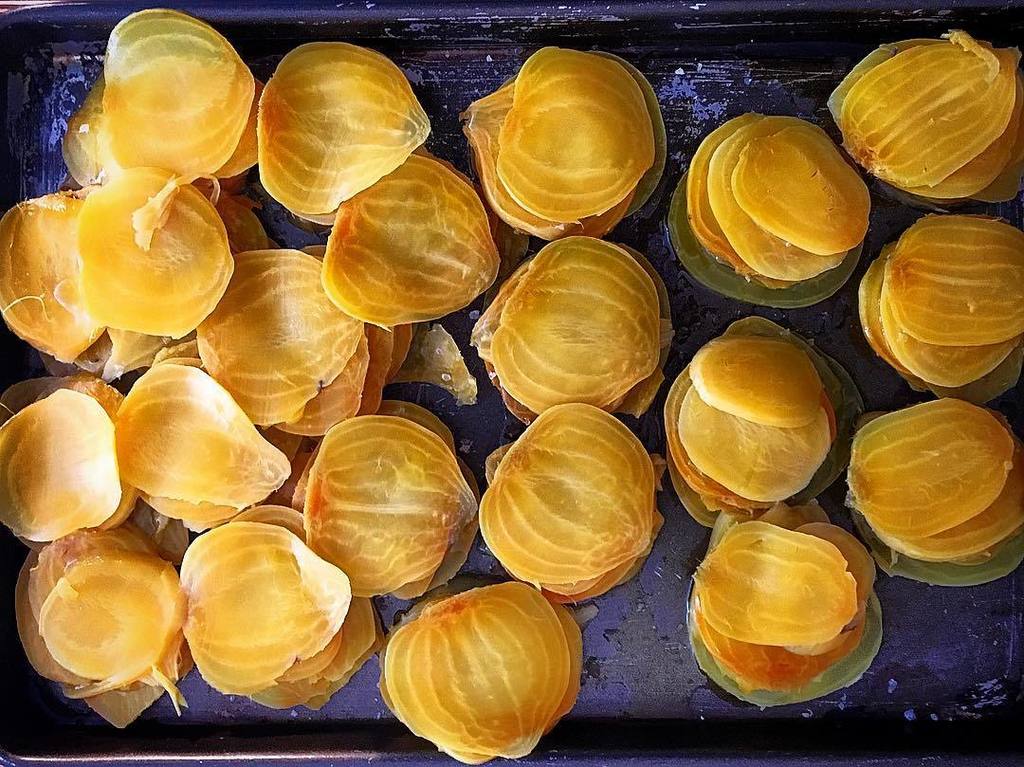 GabeWaterhouse's tweet photo. Golden beets, baked then thinly sliced on a mandolin ready for tonight’s supper club @thewaterhouseproject https://t.co/VqCHhIprAL https://t.co/cuVTJTWZO9