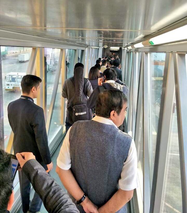 This is why we call Bharatiya  Janata Party , the party with a difference !
Our Union Minister stands patiently in lanes to board a flight !