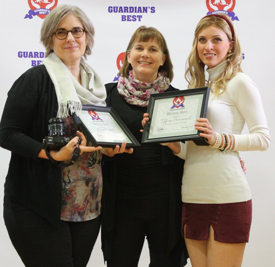GuardiansBest's tweet photo. Frontier Animal Society director Caroline Kemp presents Unsung Hero Awards to Yvonne Richard and Tiffany Stevanovich at last weekend's #Party4Paws in Montreal. Congrats! #petlover #petrescue https://t.co/T0Uj4gEvx8