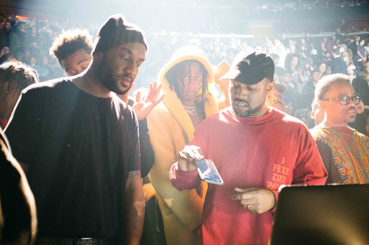 Trashvis's tweet photo. Virgil and Kanye look like parents tryna figure out how to use an iPhone lmaooo https://t.co/7aPpk4qKus