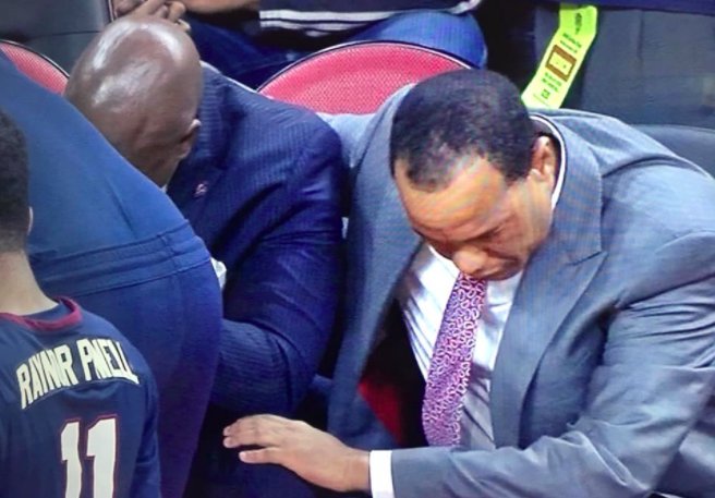 PackPride's tweet photo. Powerful moment during today's game: @CoachKeattsNCSU kneeling alongside South Carolina State coach and praying for Ty Solomon. Chills. https://t.co/sLrDupdddh https://t.co/ZOkT04EOLA