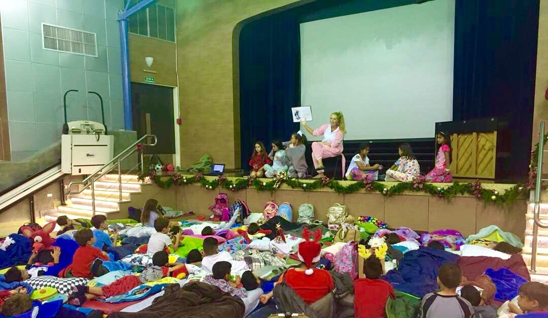 Guest reader at the 3rd grade Slumber Party in my dragon PJ's - I love my job #FridayNightFun #TheGrinch