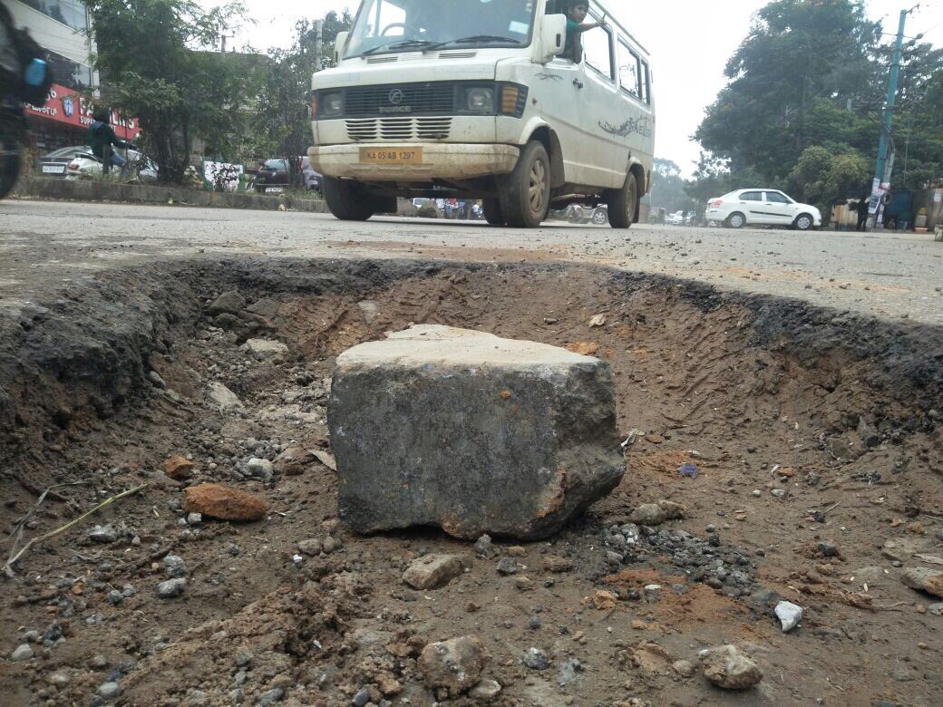 #PotholeYatra guess what? It’s a pothole. No.271 on ITPL Main Road. Shameful #BBMP <a href="/thekjgeorge/">KJ George</a> <a href="/CMofKarnataka/">CM of Karnataka</a> <a href="/WFRising/">Whitefield Rising</a> <a href="/kiranshaw/">Kiran Mazumdar-Shaw</a> <a href="/TVMohandasPai/">Mohandas Pai</a> <a href="/rajeev_mp/">Rajeev</a> <a href="/NavBharatDP/">Nav Bharat</a> <a href="/BPACofficial/">B.PAC - Bangalore Political Action Committee</a> <a href="/RevathyAshok/">Revathy Ashok</a> <a href="/rajeevgowda/">Rajeev Gowda</a> @BBMPCOMM1