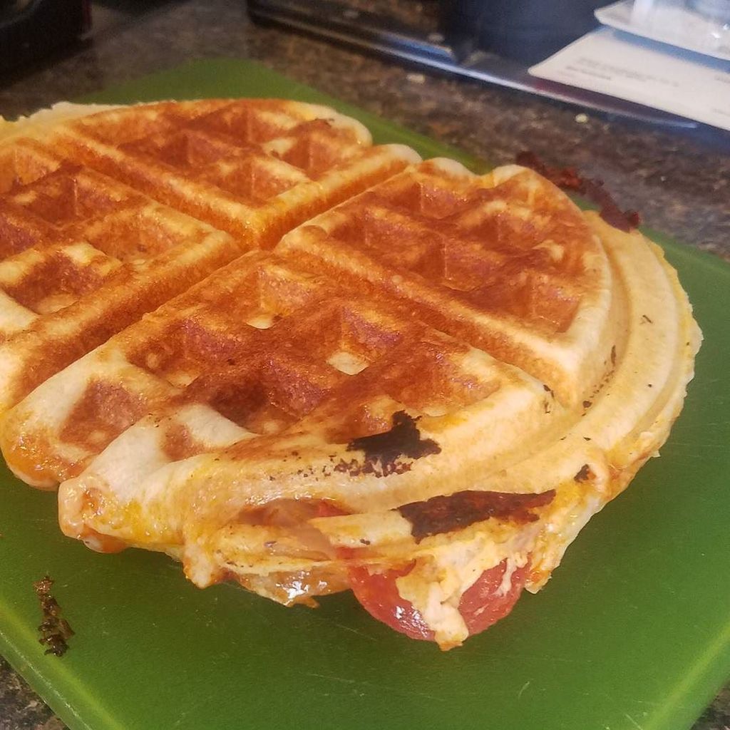 wafflesundaypod's tweet image. Is that a pepperoni peeking out? Yes. It is. And that means one thing! Pizza! Waffles! That's right, pizza waffles!

#pizza #waffles #waffle #sunday #podcast ift.tt/2BETAhV