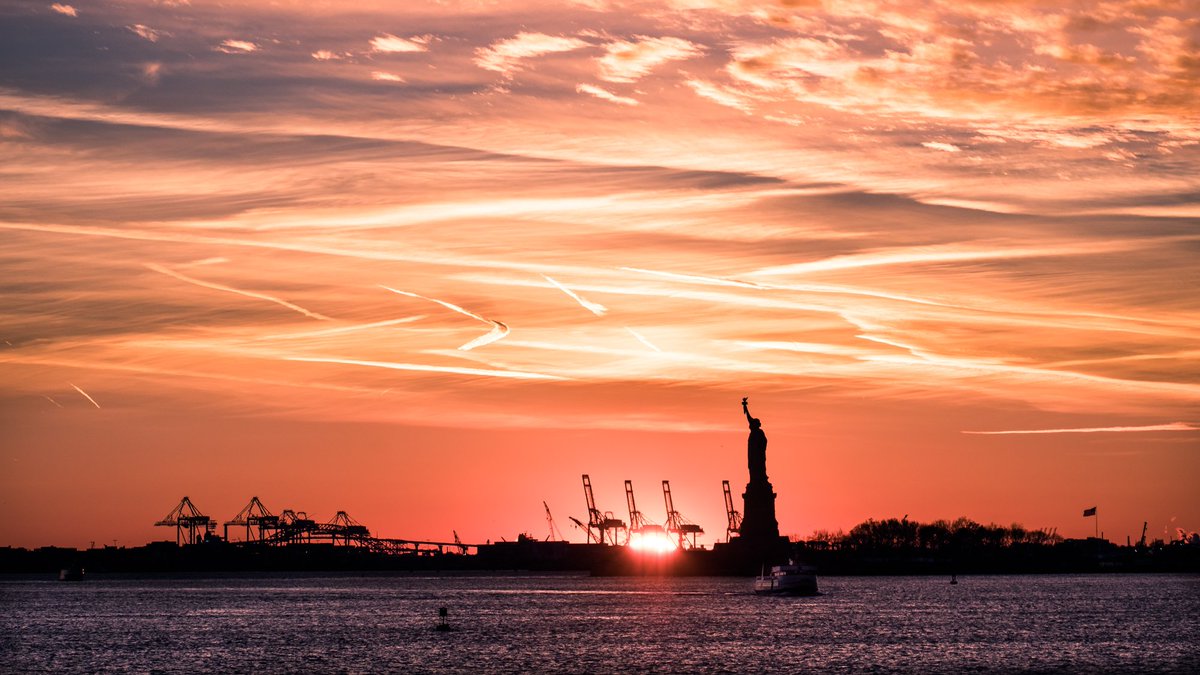 The Statue of Liberty at sunset New York Travel photography travel sunsets NewYorkCity