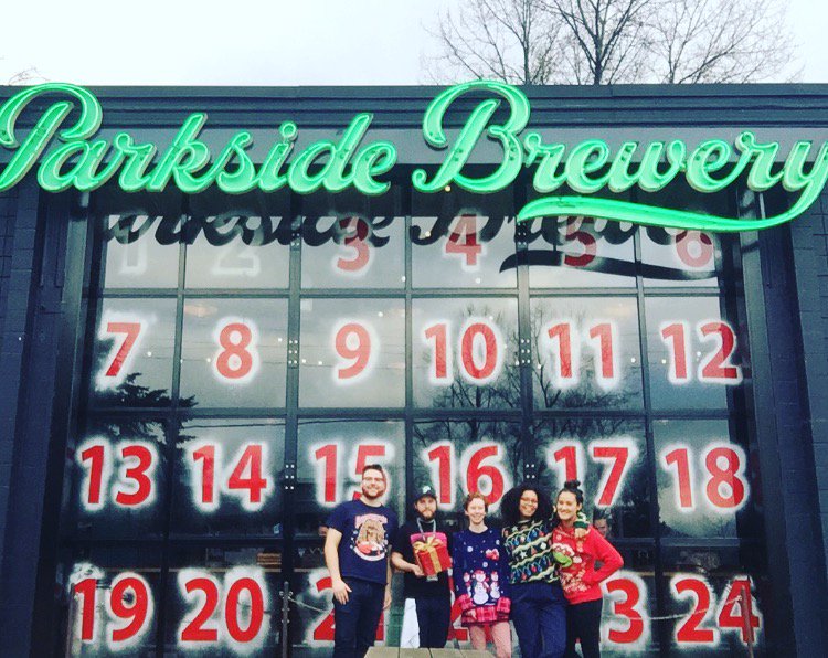 Come visit our festive staff (and Jon) until 9pm today! The <a href="/rollingcashew/">Rolling Cashew</a> is here til 7pm! Advent Deal of the Day: Free 11oz Parkside glass with purchase of a Dad Hat! #parksidebrewery #brewersrow #portmoody #JonLovesXmasHugs