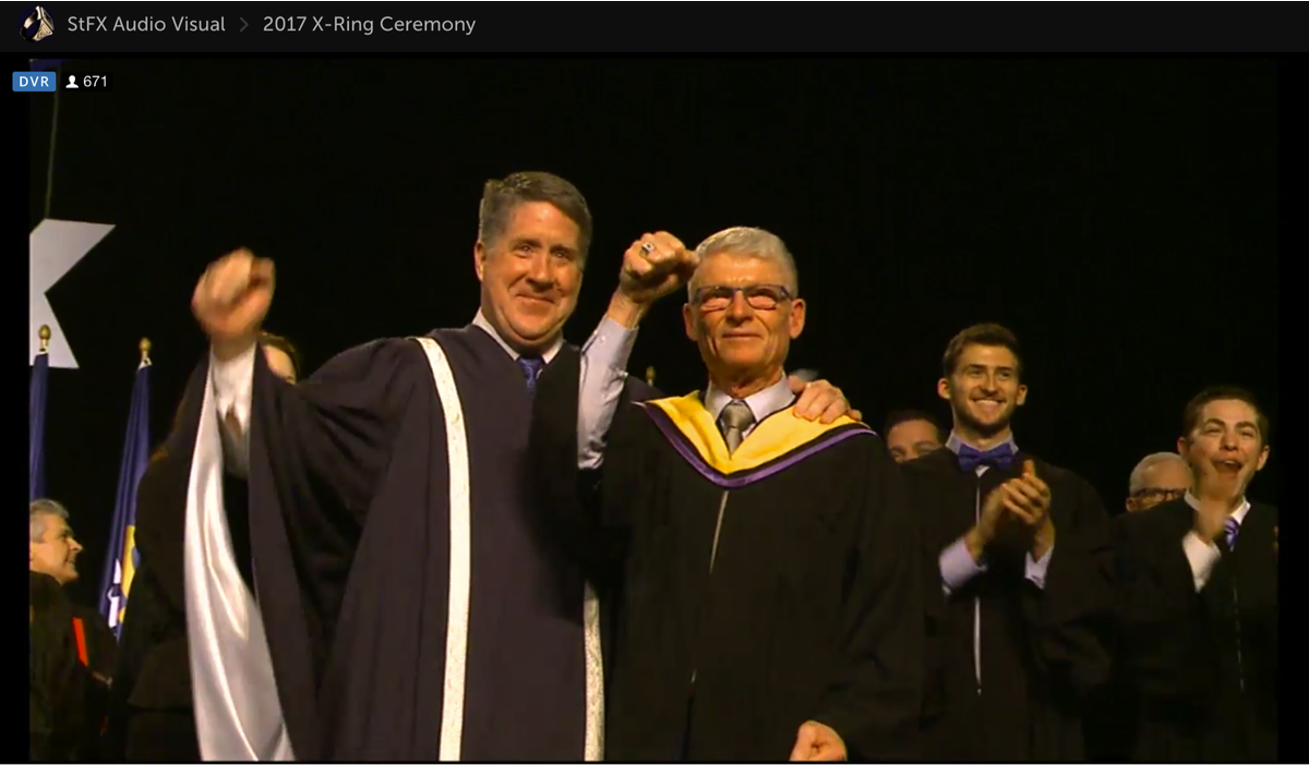 stfxuniversity's tweet photo. Congratulations Dr. Roy Rasmussen -- recipient of this year's honorary X-Ring! So well deserved!! And by the reaction, I'd guess it really was a surprise! @StFXAlumni @TheUOfficial https://t.co/JeL8XjHOEz
