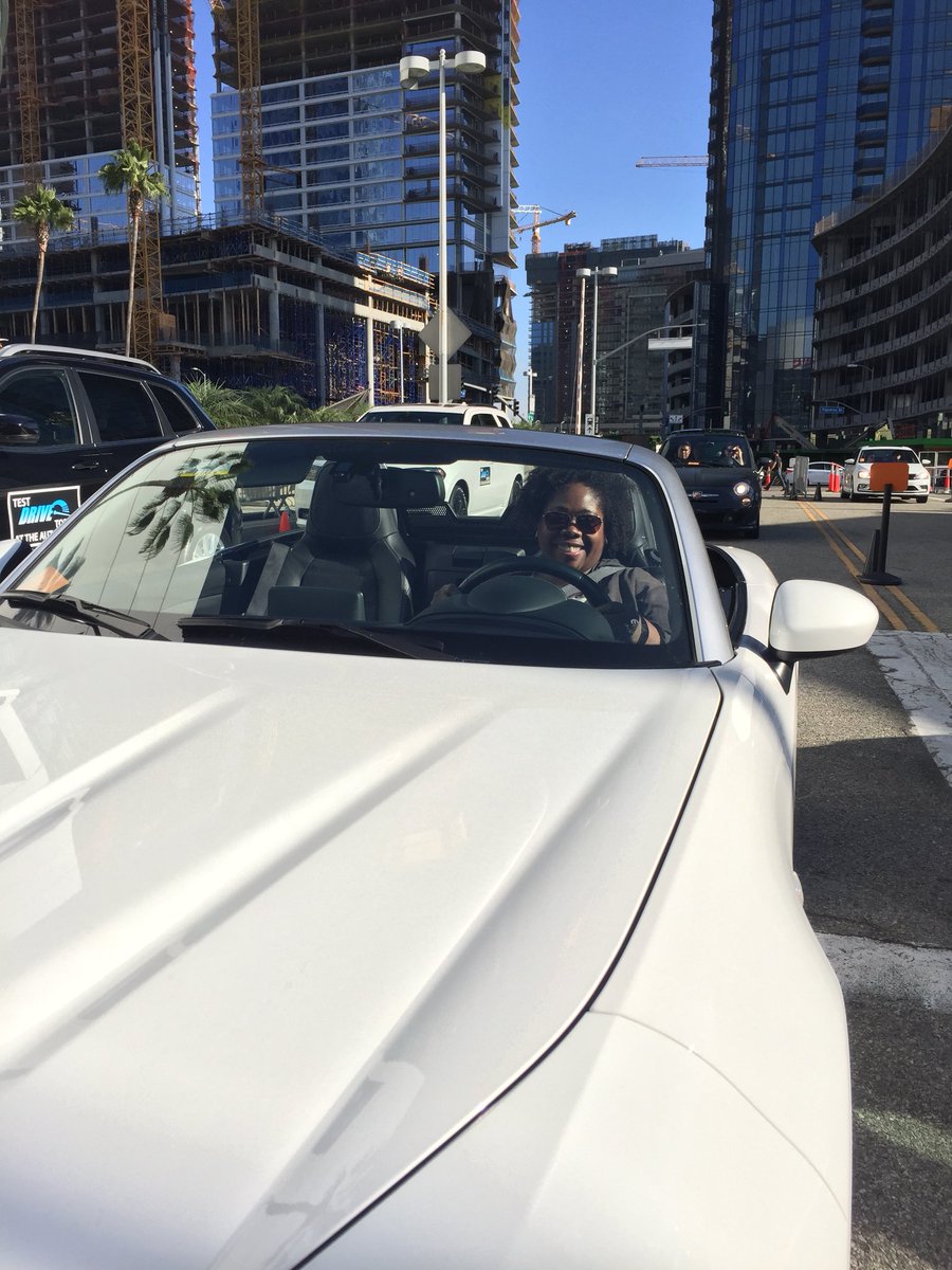 cherry_LA's tweet photo. I look good behind the @fiat #124Spyder @LAAutoShow @ConventionLA #LAAS #LAAutoShow #Carchick #TestDrive  #curlyhairdontcare #unclefunkys #dtla https://t.co/k1iKZgZHPM