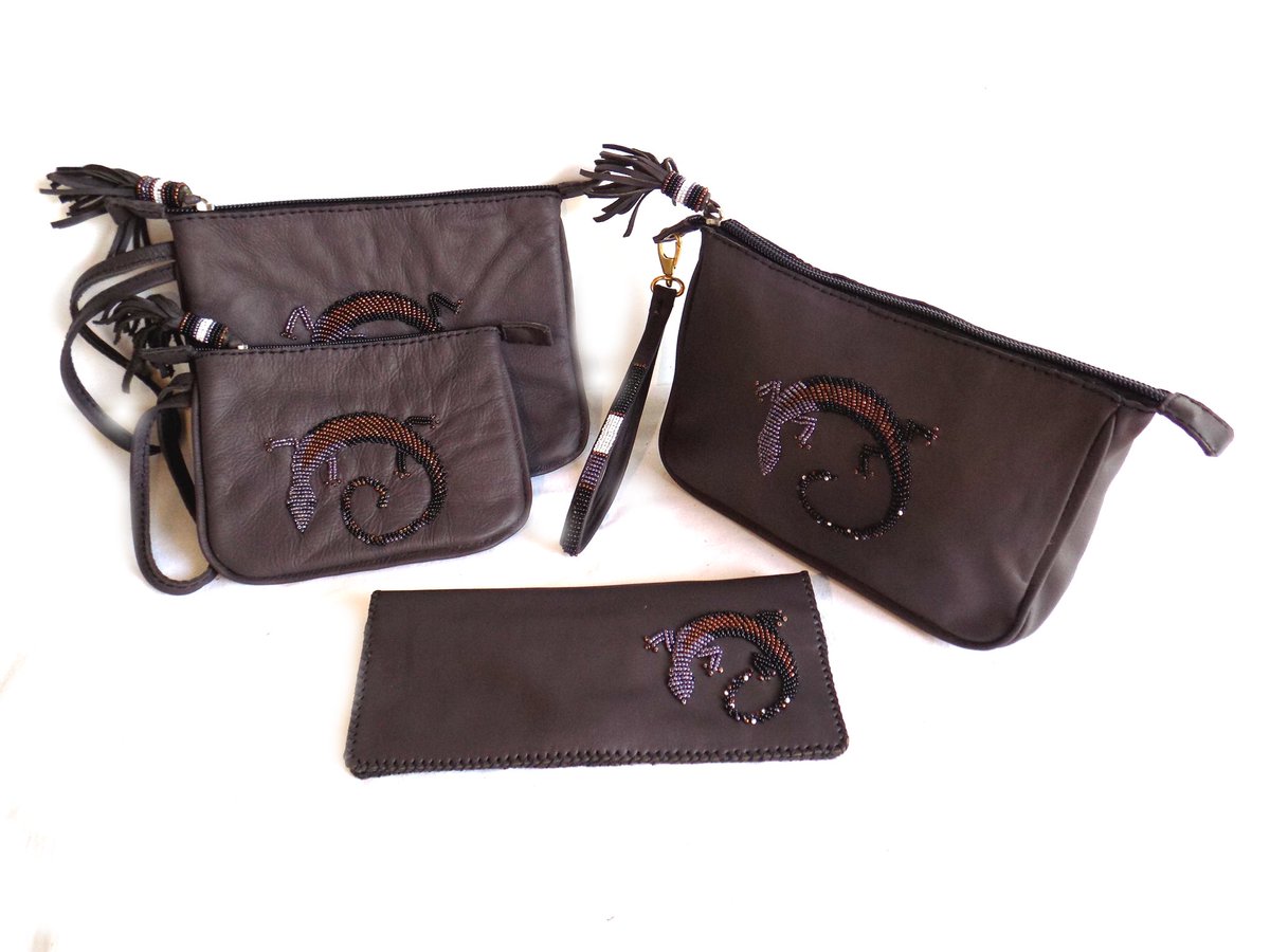 Zinjdesign's tweet photo. A Zinj accessory is a thing of beauty:  made from the softest leather and painstakingly decorated in exquisite, African beadwork in the tradition of a culture that has been here for millennia. #handmadekenya #dogcollars #safaribelts #leatherstuff #lifetime #handbags #accessories https://t.co/WvO1IvwPKL