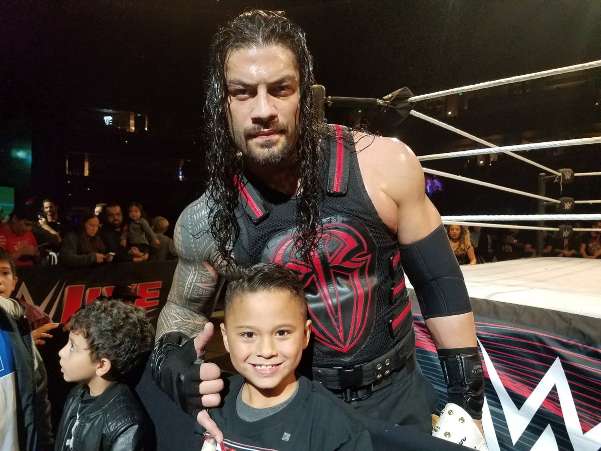 paulballx3's tweet photo. #WWEAnaheim I had an awesome time with my wife and son. Topped it off with a pic of my son and Roman Reigns https://t.co/GDa7NpQ3dl