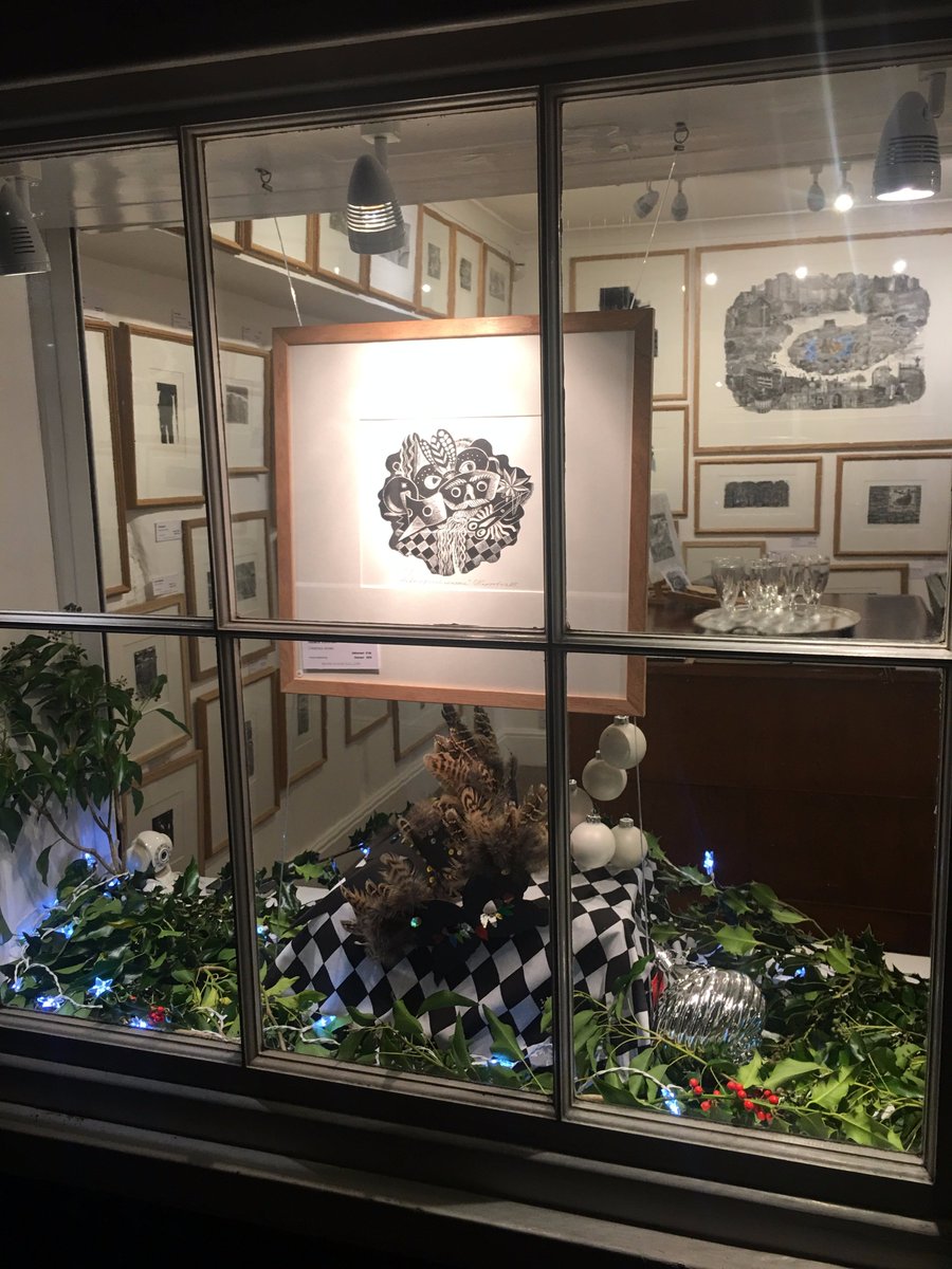 We have loosely based one of our Christmas window displays on Vladimir Kortovich's Christmas Masks, currently in the <a href="/woodengravers/">SWE</a> 80th Exhibition. #woodengraving