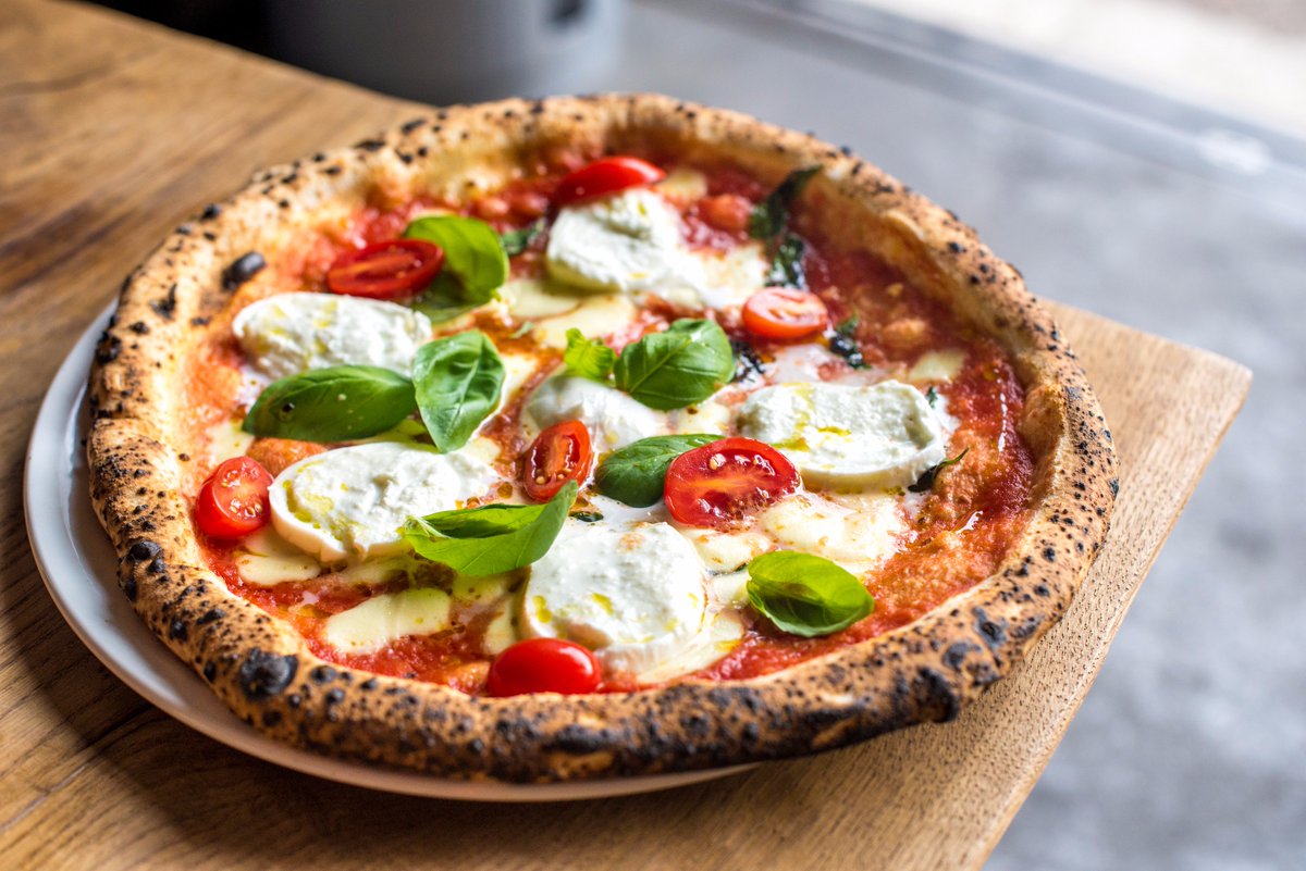 A Copenhagen pizza joint in the heart of London's Battersea. See our 7.7 review of Mother PIzza: eeeeeats.it/2wVVBUb