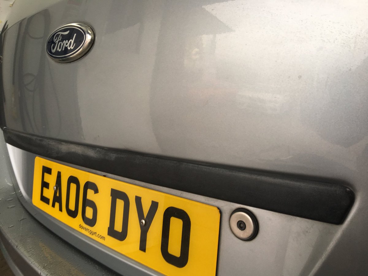 Ford Fusion dented tailgate with a crease line through the bottom of the dent. Tidied up nicely using #PDR Repaired by craig <a href="/dent_men/">Michael & Craig</a>
