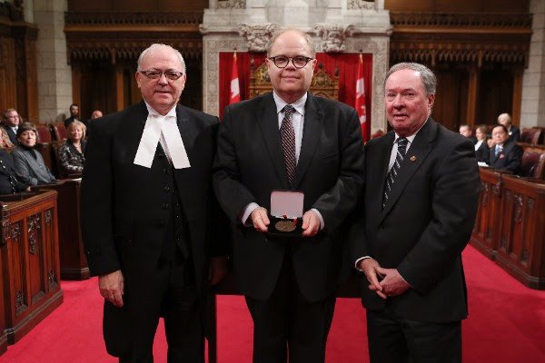 HuntingtonUni's tweet image. Congratulations to HU's @PresMcCormick who was recently presented with a Senate of Canada 150 Medal!   @SenatorMunson  @GeorgeFureyNL
