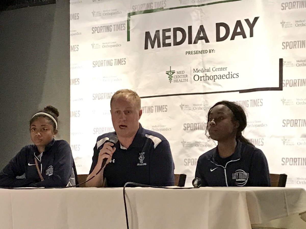 Warren Central Lady Dragon’s on the stage 2017 Media Day. Coach Joe Hood, Sr’s Tiffany Taylor, Dasia Shanklin.