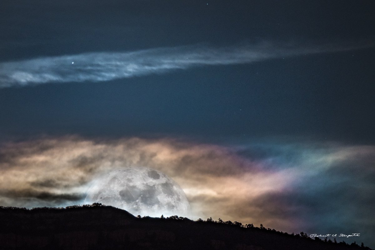 Super Moon makes Iridescent clouds as it rises over Sandia Mountain, Albuquerque, NM Sunday night. Shot from my driveway in the northeast heights. <a href="/KRQEMark/">News Junkie</a> <a href="/ByronKOAT/">Byron Morton KOAT</a> <a href="/KOB4/">KOB 4</a> <a href="/newmexicotrue/">New Mexico True</a> #newmexicoTRUE <a href="/NewMexico/">New Mexico TRUE</a> <a href="/VisitABQ/">Visit Albuquerque</a> #clouds #supermoon2017
