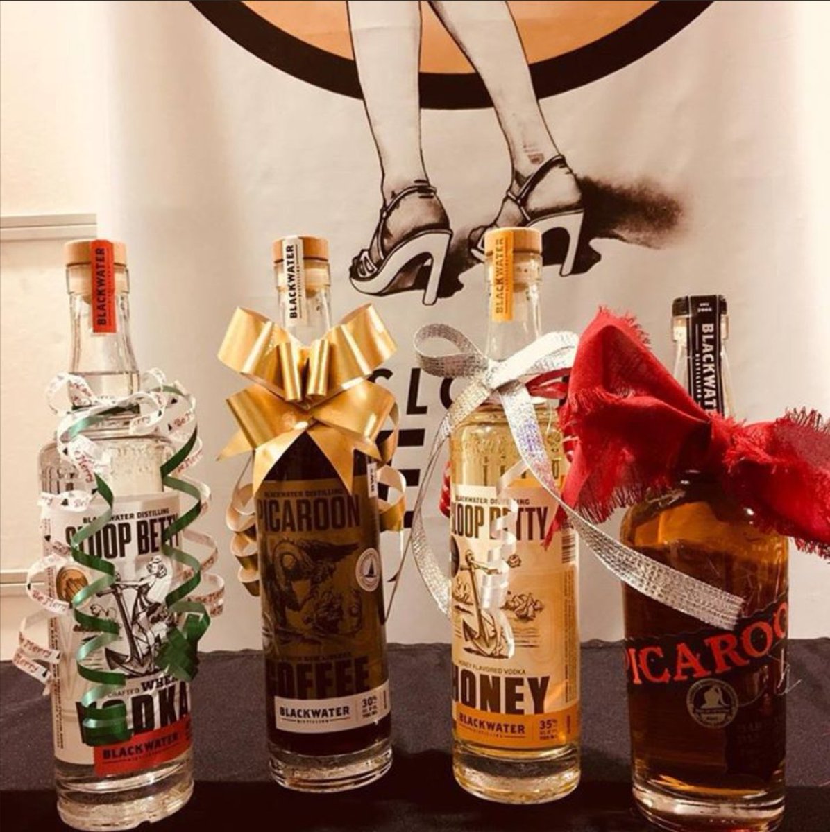 sloopbetty's tweet photo. This holiday season, skip the wine-in-a-bag gift for your favorite host and give them a festive bottle of #SloopBettyVodka or #PicaroonRum instead. We'll wrap it for you if you drop by the distillery on a Sunday in December! #drinklocal #shoplocal #MakeMineInMaryland https://t.co/IrOxSuCzcb