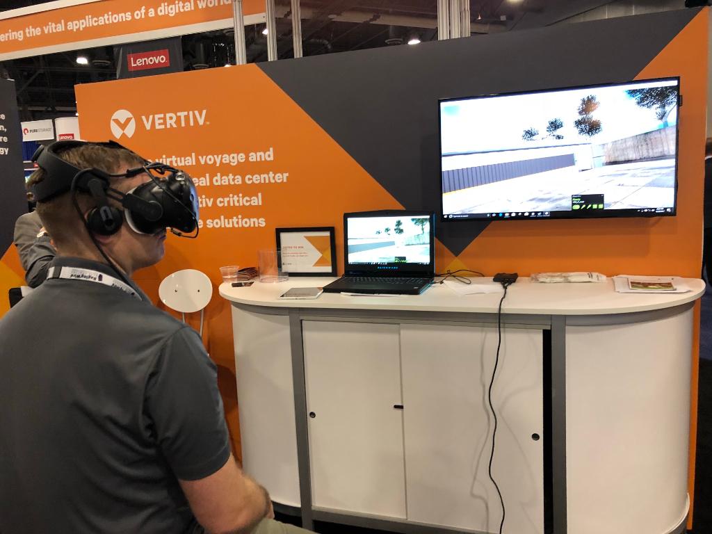 Vertiv's tweet image. Come to #GartnerIO booth 231 and try our #datacenter Virtual Reality experience! #GartnerDC #VertivRobot
