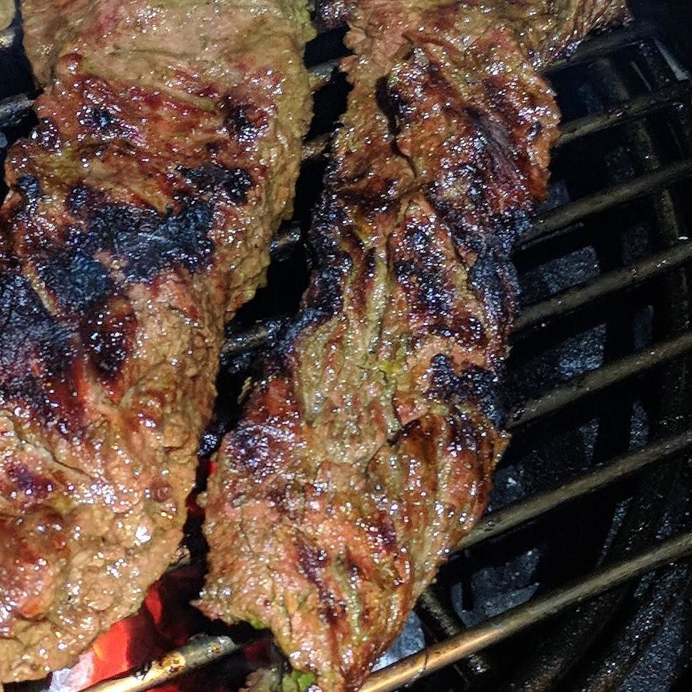 natureskitchn's tweet photo. Cooking outside at night reminds me of many nights in the Jamaican countryside in the hills cooking aka #runningaboat with cousins and friends.  Only then it wasn't #skirtsteak marinated with #mojo, cooked on a #biggreenegg.  It was most likely #curried … https://t.co/IQCIYHLQ1B https://t.co/aZUWKuBMUZ
