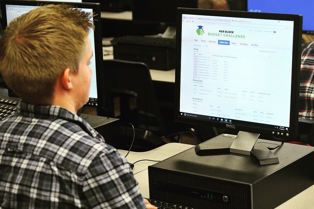 SHS_RedDevils's tweet photo. Simon Laraway works in Ms. Tuttle’s Financial Literacy class. #oneofus #shs_reddevils https://t.co/fnV6FFlXKI https://t.co/NsnI3fSILl