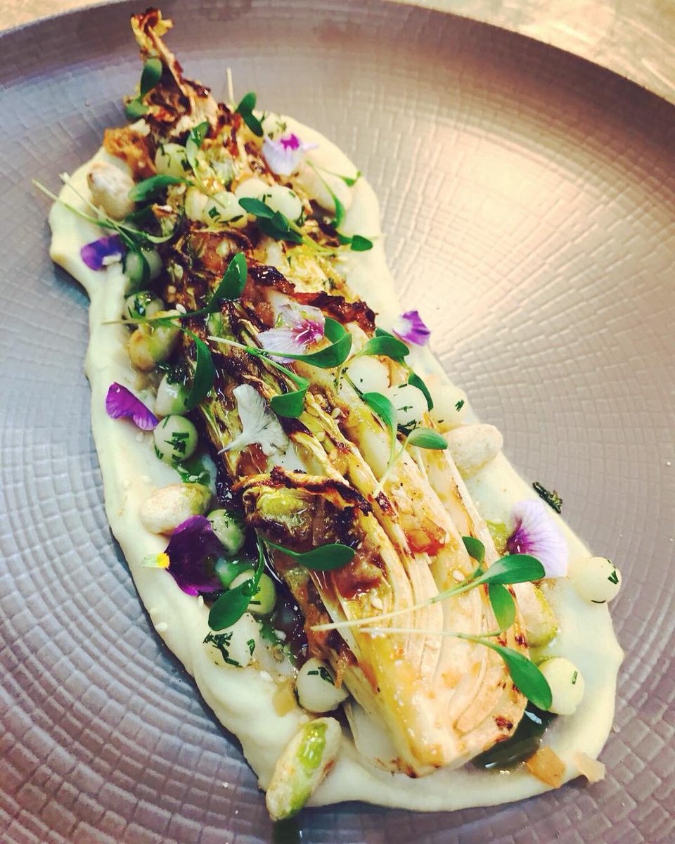 Check out this vegan dish from our fantastic chef Faye.
Celeriac puree, preserved lemon, smoked charred and whiskey/miso glaze cabbage, crystallised sesame peanuts, coriander oil and cress. #vegan 

 <a href="/FayeDeSouza/">Faye De Souza</a>