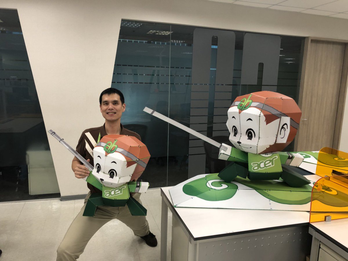 Who's that handsome guy? Well, me, of course! But a couple of WuKongs have made it to the office too - they're always monkeying around.