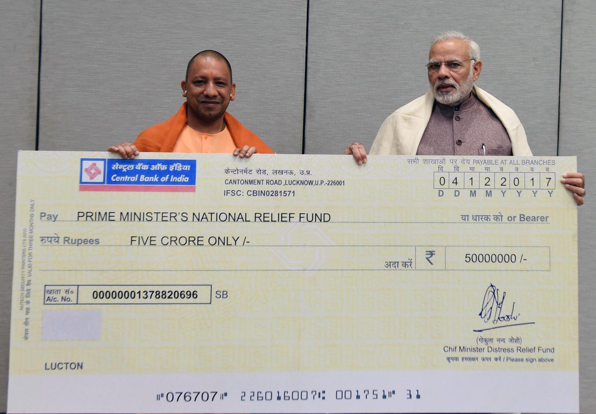 PMOIndia's tweet photo. Chief Minister of Uttar Pradesh, Shri @myogiadityanath met PM Shri @narendramodi. He presented a cheque worth Rs. 5 crore from the CM Distress Relief Fund towards the PMNRF, for cyclone affected people in various parts of the country. https://t.co/YWRwV51Edu