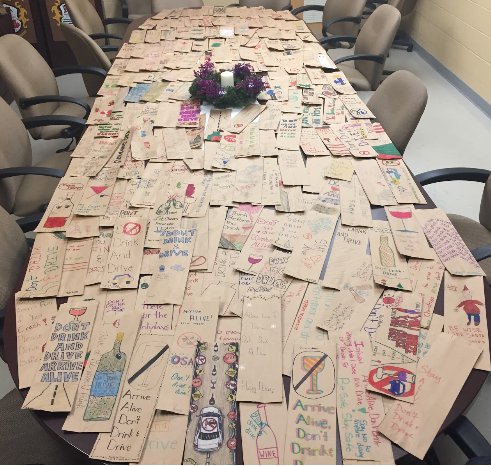 SJDB_OSAID's tweet image. Hundreds of LCBO Bags decorated by @SJDBrebeufCHS students with anti-drinking and driving messages to help save lives