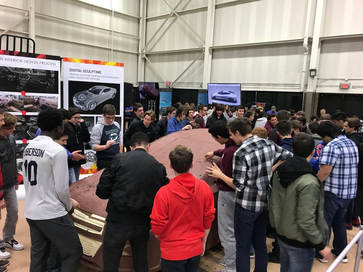 Getting their hands on a full scale clay model