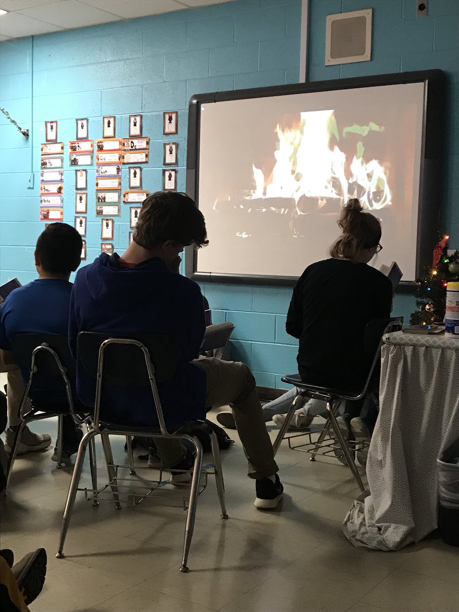 deb_djellison's tweet photo. Reading by the fire in ELA!  @HMSIndians #hmstntribe https://t.co/cNqiBvl58K