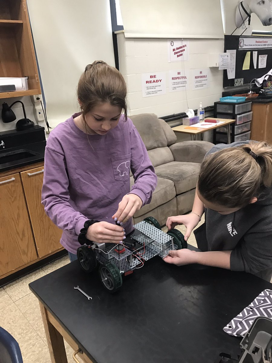 Designing, building, and testing automated drag racers