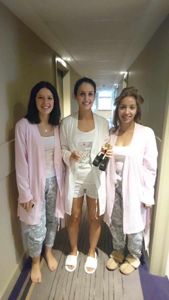 Bride and bridesmaids in house share some processco, chocolates and a card for the bride to be. <a href="/pi_farnham/">Premier Inn Farnham</a>