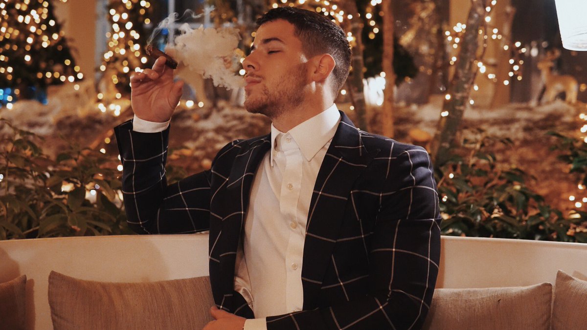 nickjonas's tweet photo. A celebratory cigar after a long day. More #jumanji promo carries on tomorrow. Berlin here we come! https://t.co/feWBV2PTk4