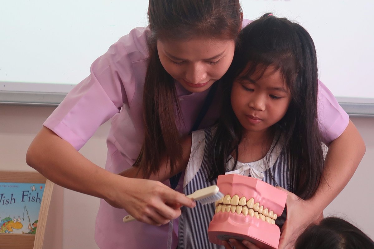 SISC_Official's tweet photo. Dentists from @Roomchang Dental Hospital visited @SISC_Official today to teach us the important of oral hygiene and how to #brush our #teeth. The @The_IEYC includes a #learningstrand on healthy living and physical well-being. https://t.co/Jq5h9gufX1
