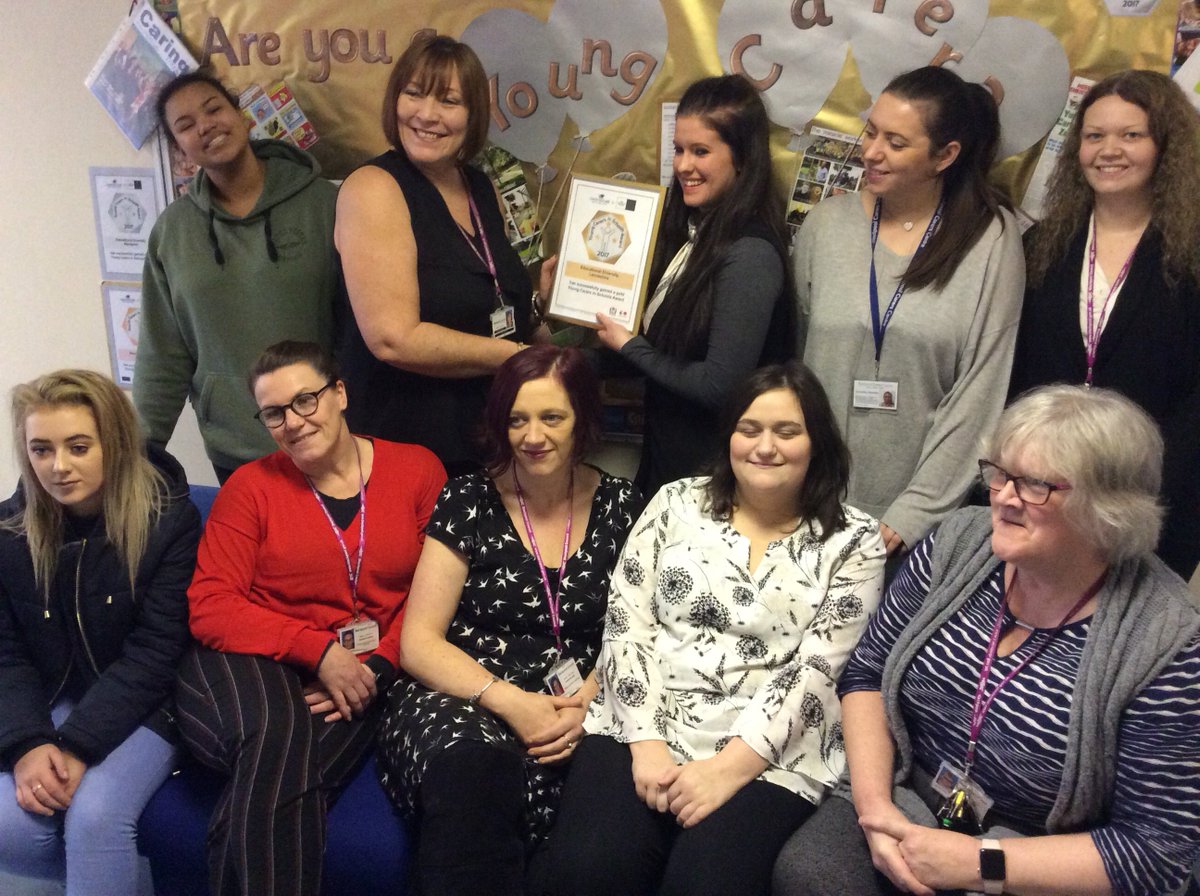 Educational Diversity staff and students proudly receive the Gold Award from the Young Carers team.