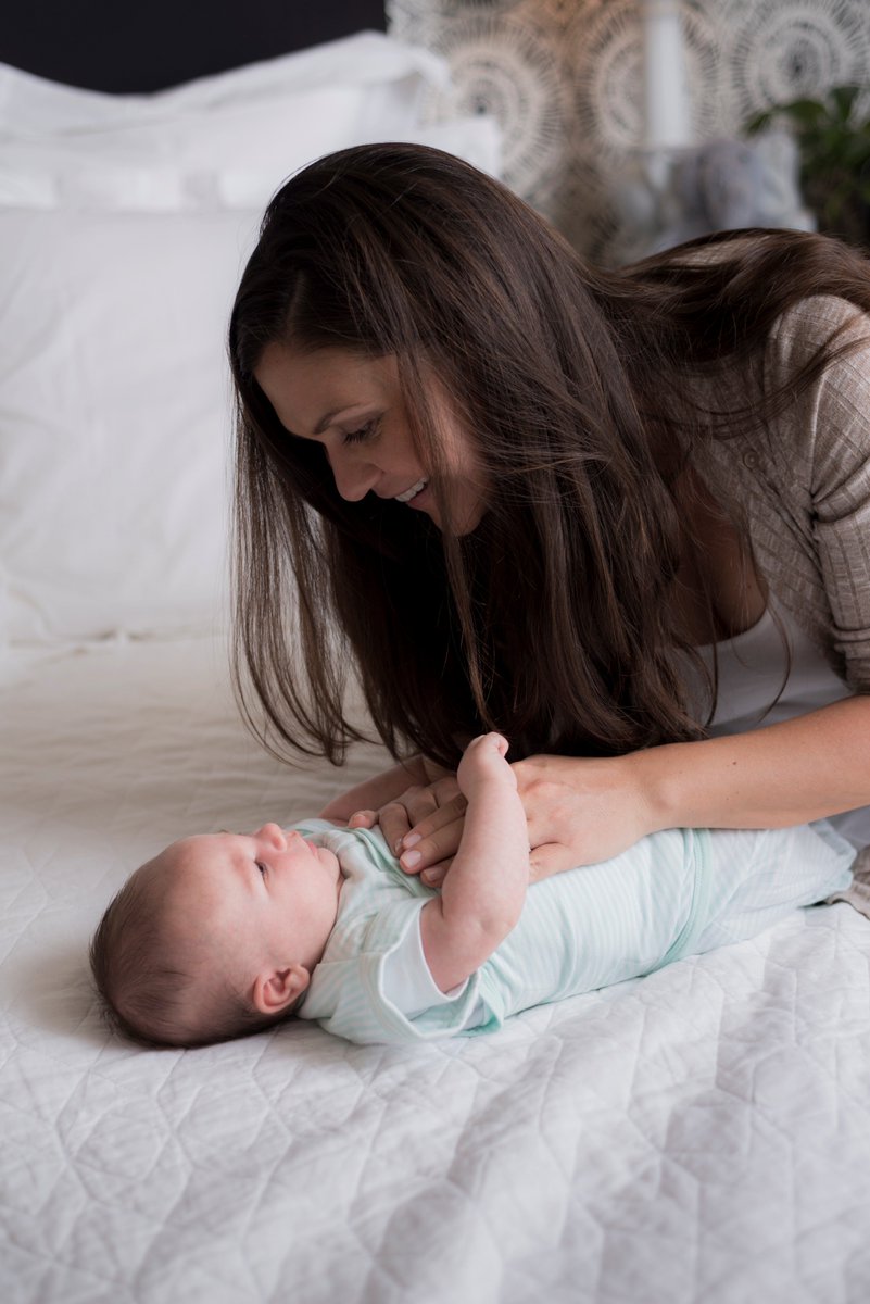 Our 2-way SwaddleOut helps babies gradually transition to sleeping arms free! Shop the mint stripe swaddle: bit.ly/2BKHxQ1