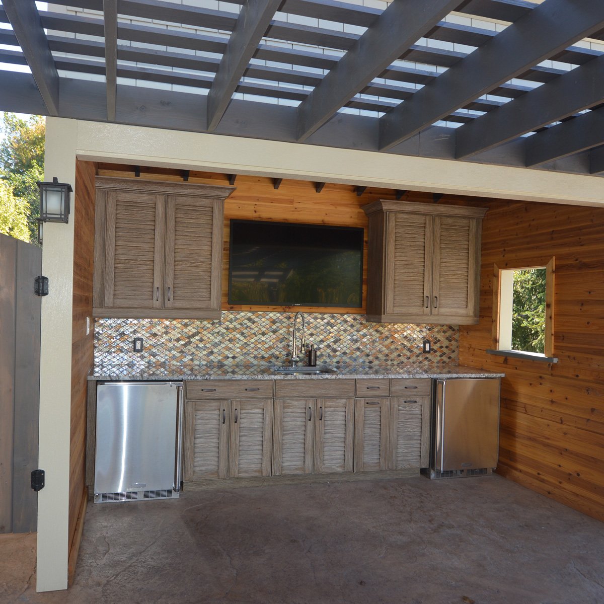 NatureKast's tweet photo. Today is a double-header for @ODBSCabinetry. They have also delivered a  classic cottage style look using #NatureKast weathered desert tan to  showcase yet another style option available for #outdoorcabinets. https://t.co/rnKx0tuIlb